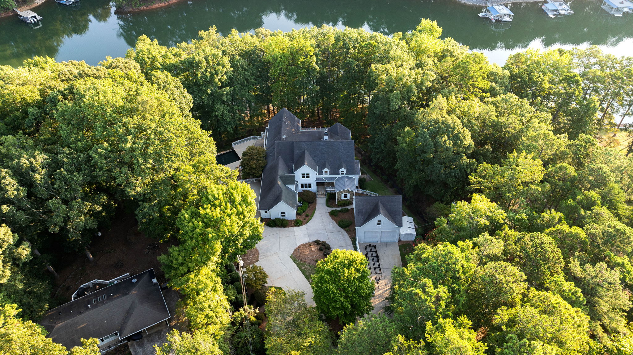 Aerial view of lakefront estate in Cumming, GA